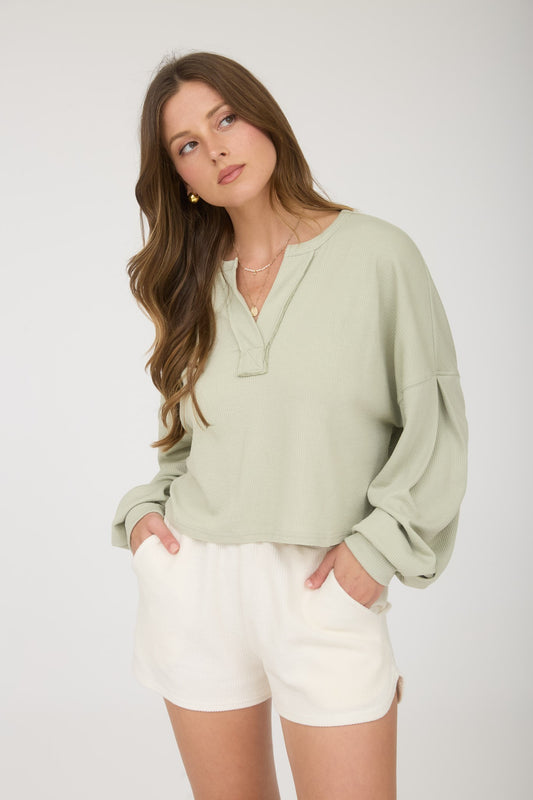 Split Neck Long Sleeve Cropped Knit Top